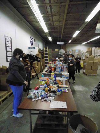 Chakra employees sort donations at their Lancaster facility.